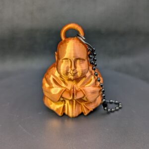 Caked Up Buddha - a goofy keychain