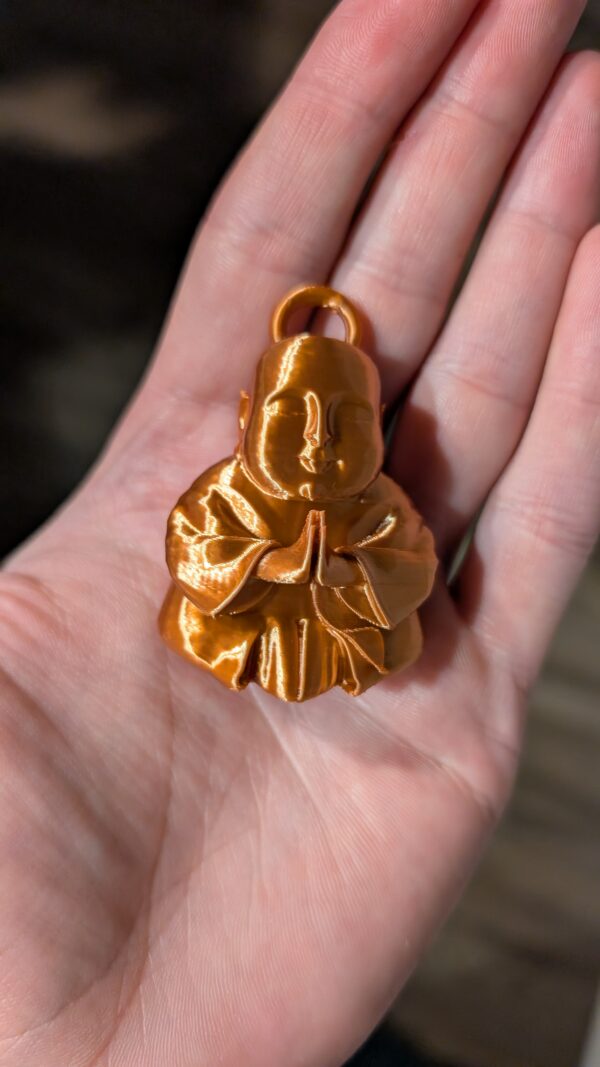 Caked Up Buddha - a goofy keychain