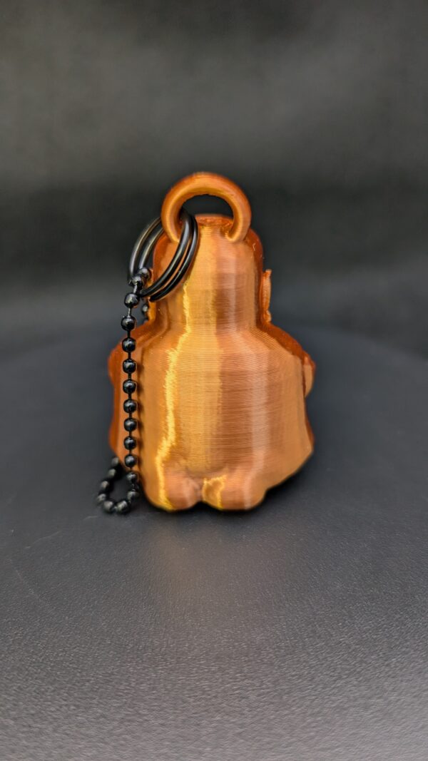 Caked Up Buddha - a goofy keychain