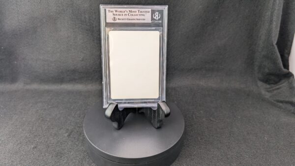 A professionally graded Magic: The Gathering card, Artifact Possession from the 1994 Antiquities set, encased in a clear Beckett acrylic slab and graded 8.5. The label displays subgrades for centering, corners, edges, and surface, and the card features artwork by Christopher Rush with a vibrant purple creature on a glowing background.