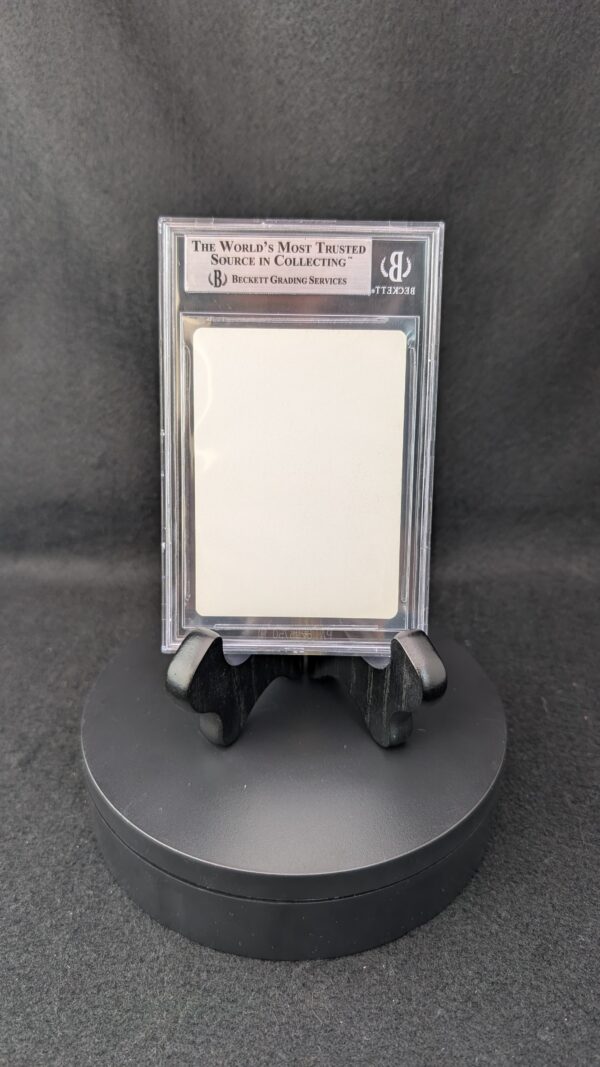 A professionally graded Magic: The Gathering card, Artifact Possession from the 1994 Antiquities set, encased in a clear Beckett acrylic slab and graded 8.5. The label displays subgrades for centering, corners, edges, and surface, and the card features artwork by Christopher Rush with a vibrant purple creature on a glowing background.